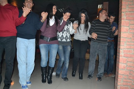 Hakkarinin Yüksekova ilçesinde 24 Kasım Öğretmenler günü dolayısıyla düzenlenen programda halay çekerek gönüllerince eğlendiler.