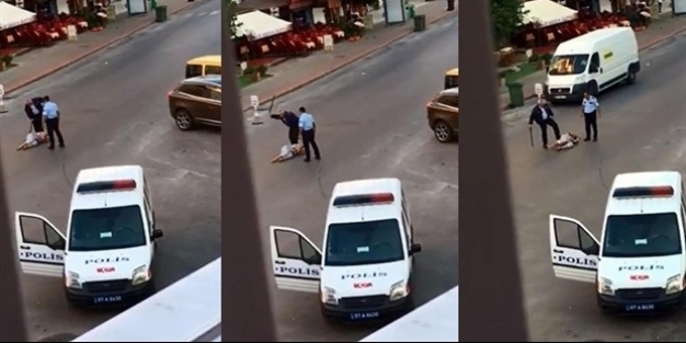 Sokak ortasında kadına dayak atan polis tutuklandı