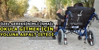 Özel gereksinimli ismail okula gitmek için yoluna...