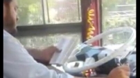 Seyir halindeyken kitap okuyan şoför için karar verildi